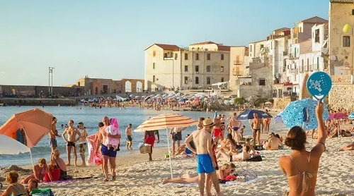 Sicilian village, small town by the sea beneath the mountain